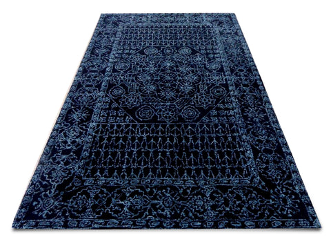 Dark base and bright colour intricate pattern generates a stark contrast which renders an interesting radiance to this carpet. Place it in the center of the room and let it catch all the attention. The two colour story makes it simple yet exquisite.